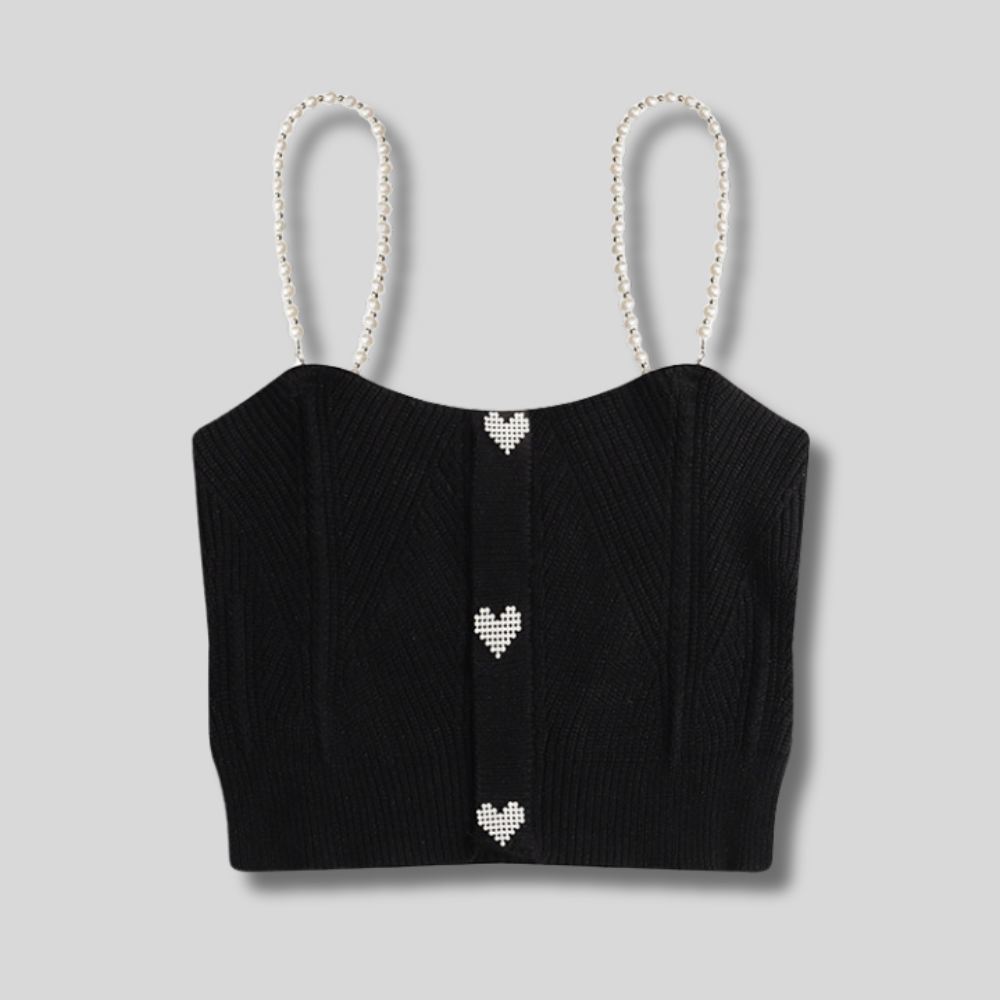 "Trendy black ribbed crop top with pearl straps and heart embellishments – stylish and chic women's fashion piece."