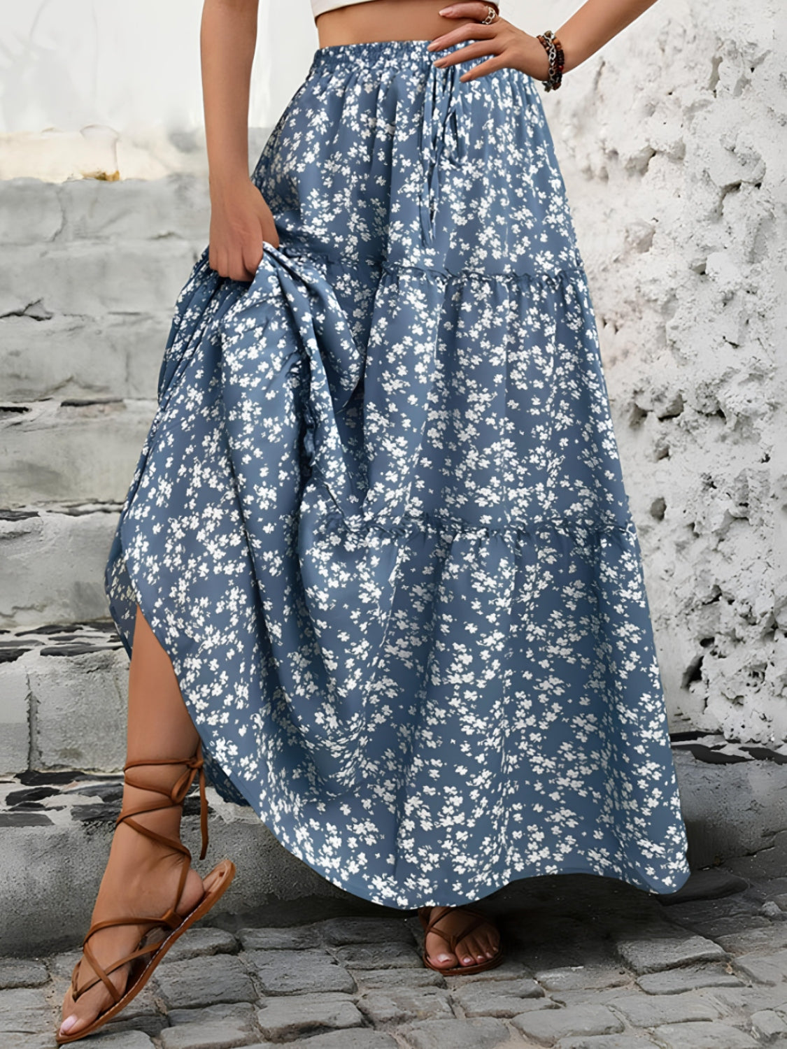 "Elegant tiered floral maxi skirt featuring a vibrant floral pattern, flowy design, and a flattering tiered silhouette for a chic, boho-inspired look"