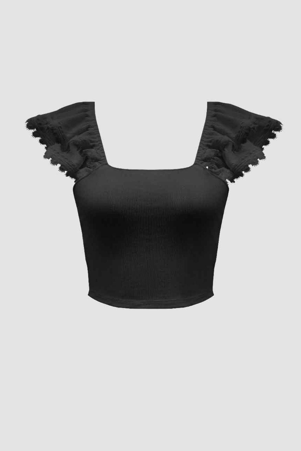 "Woman wearing a fringe tank top with tassel hem, ideal for festival outfits and casual boho style"