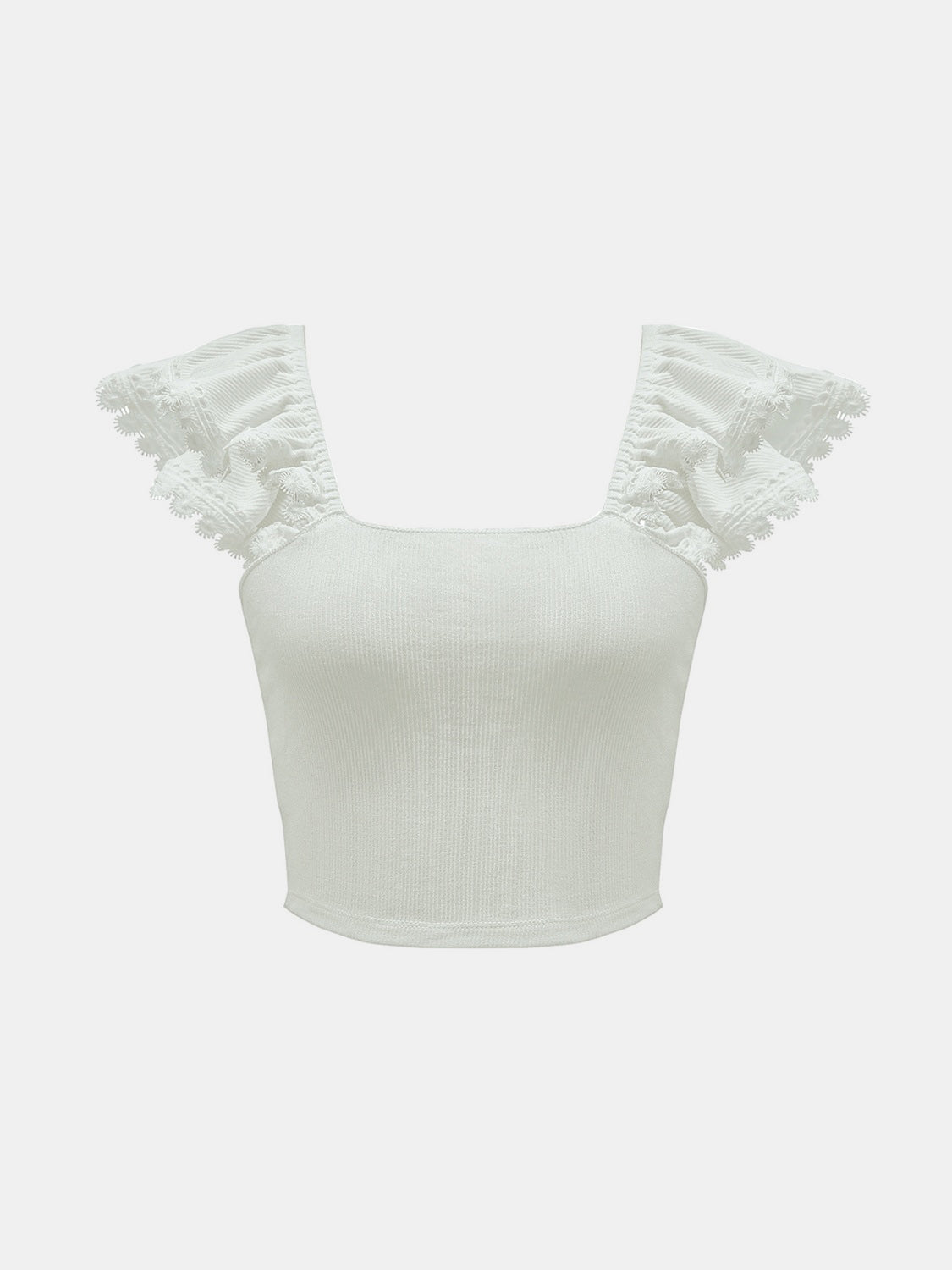 "Woman wearing a fringe tank top with tassel hem, ideal for festival outfits and casual boho style"