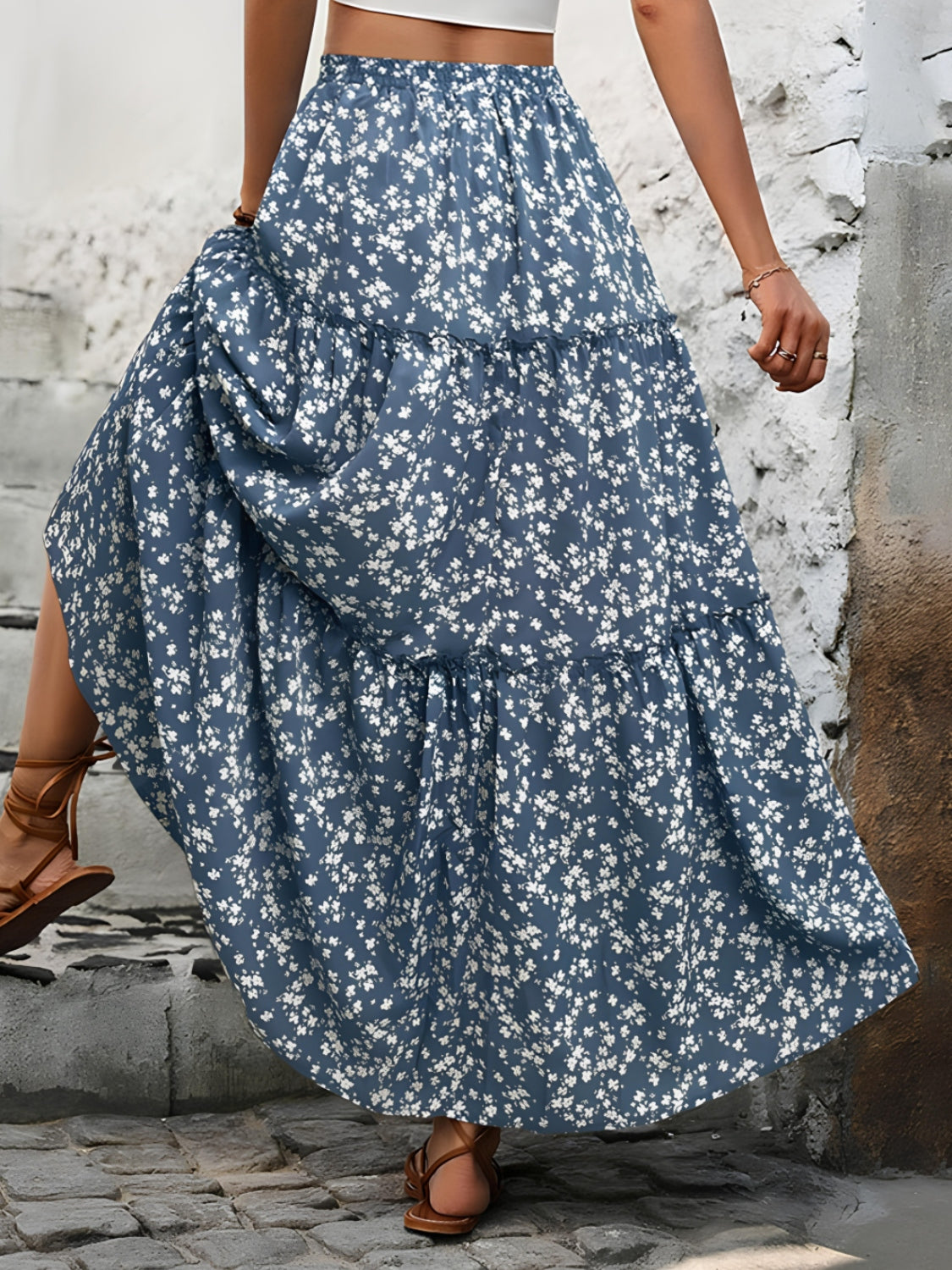 "Elegant tiered floral maxi skirt featuring a vibrant floral pattern, flowy design, and a flattering tiered silhouette for a chic, boho-inspired look"