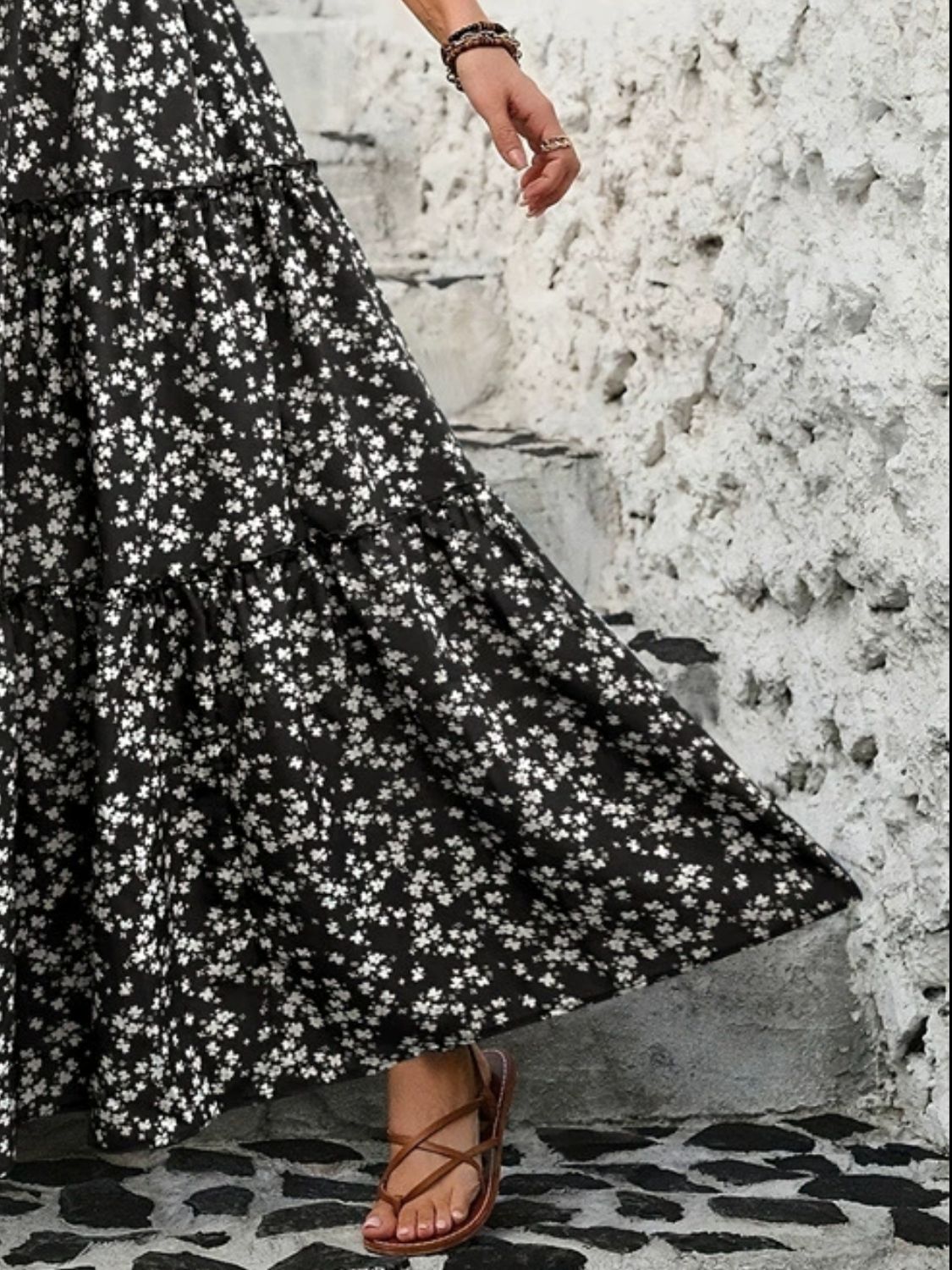 "Elegant tiered floral maxi skirt featuring a vibrant floral pattern, flowy design, and a flattering tiered silhouette for a chic, boho-inspired look"