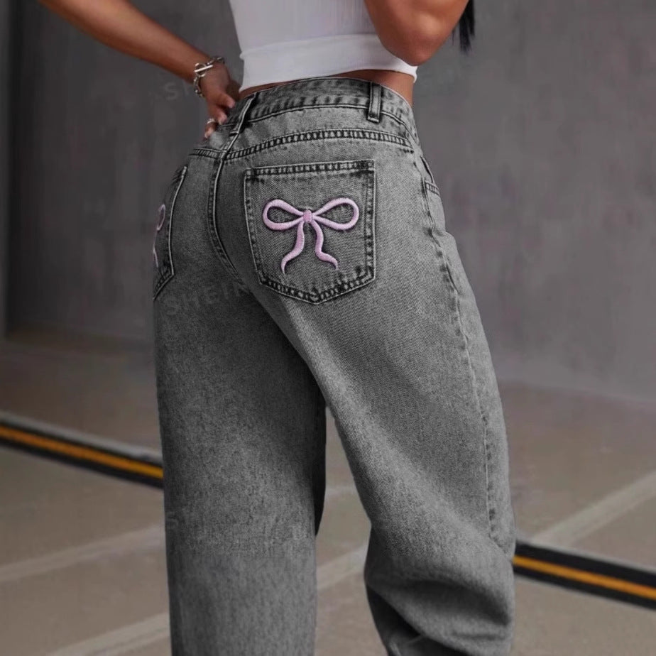 "Back Pocket Bow Jeans – Stylish denim with cute bow detail on back pockets, perfect for a trendy and feminine touch. Shop now for a flattering fit!"