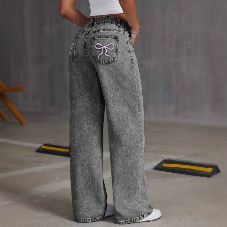 "Back Pocket Bow Jeans – Stylish denim with cute bow detail on back pockets, perfect for a trendy and feminine touch. Shop now for a flattering fit!"