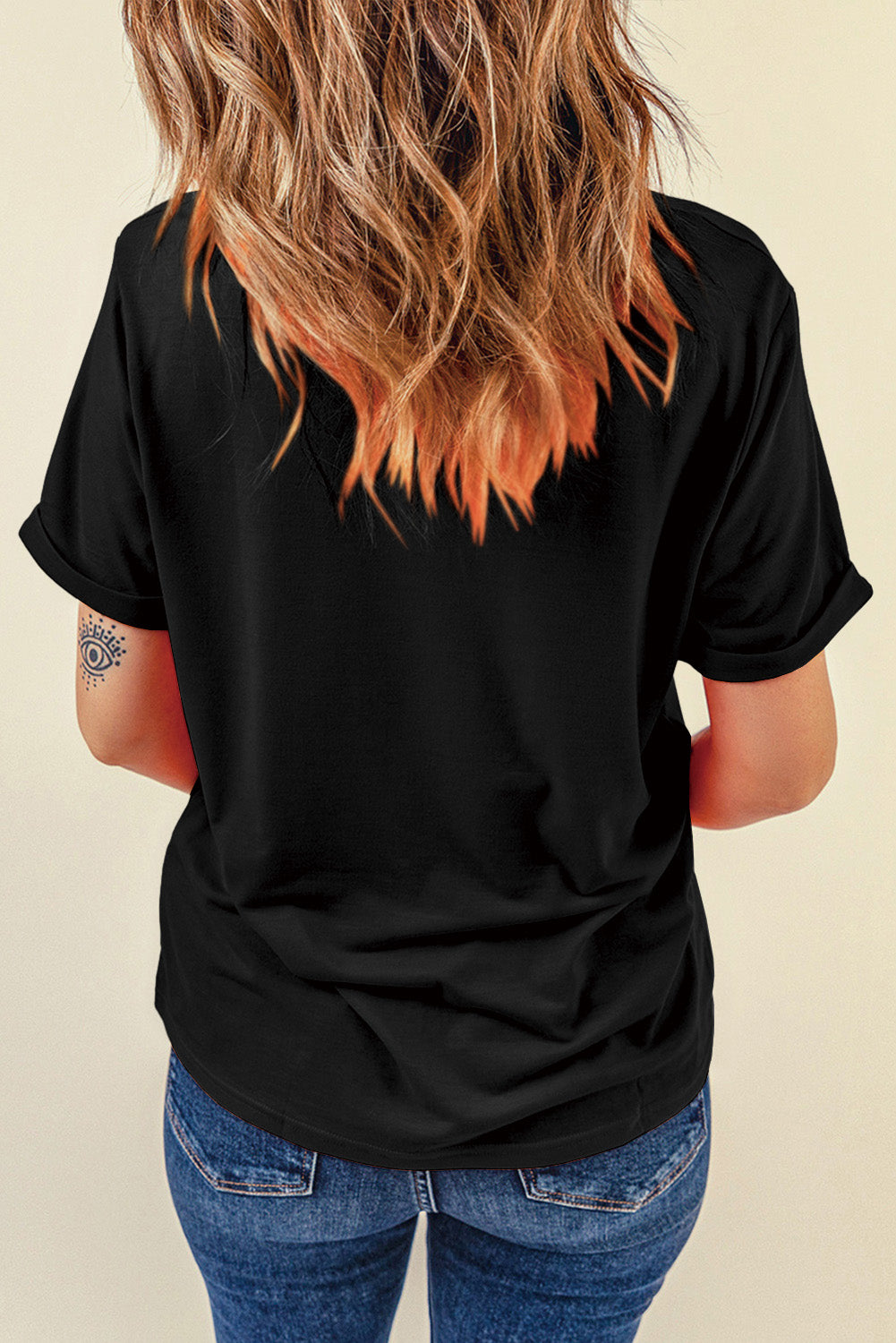 "Boots & Bow Tee – Western-inspired graphic t-shirt with a mix of cowboy charm and feminine flair, perfect for country lovers."