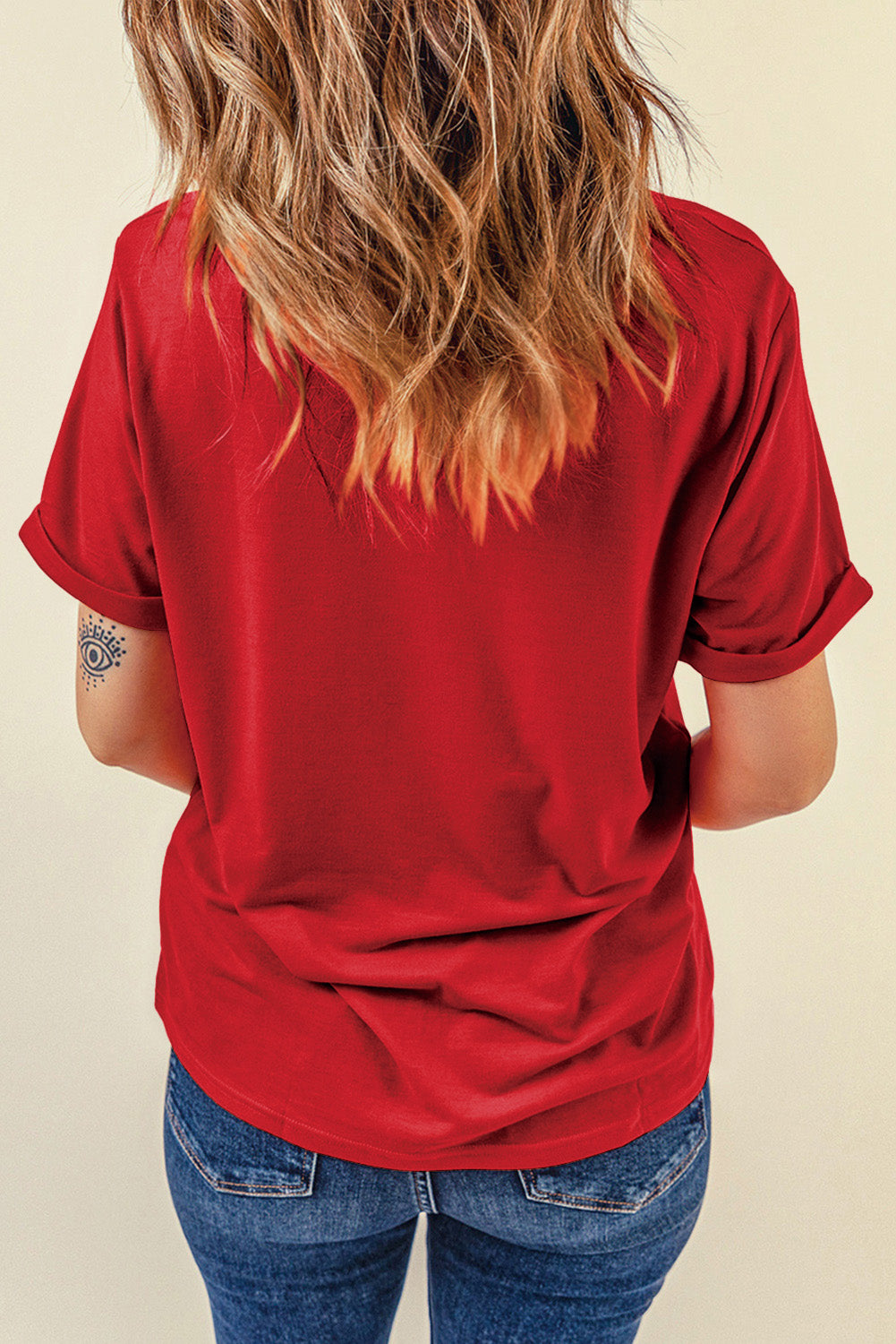 "Boots & Bow Tee – Western-inspired graphic t-shirt with a mix of cowboy charm and feminine flair, perfect for country lovers."