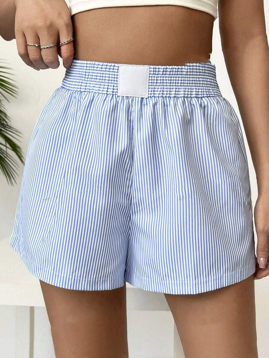 "Casual striped shorts for women – stylish summer wear, breathable polyester fabric, available in blue, yellow, and emerald green. Perfect for warm-weather outfits."