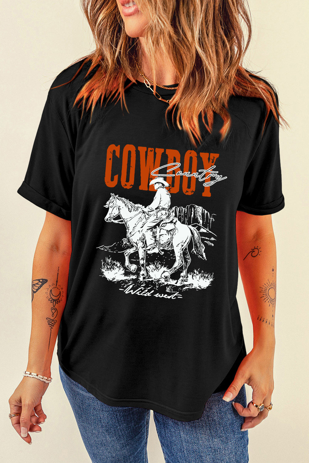 Women's Cowboy Country Tee featuring a bold cowboy graphic and classic fit, perfect for casual, western-inspired outfits."