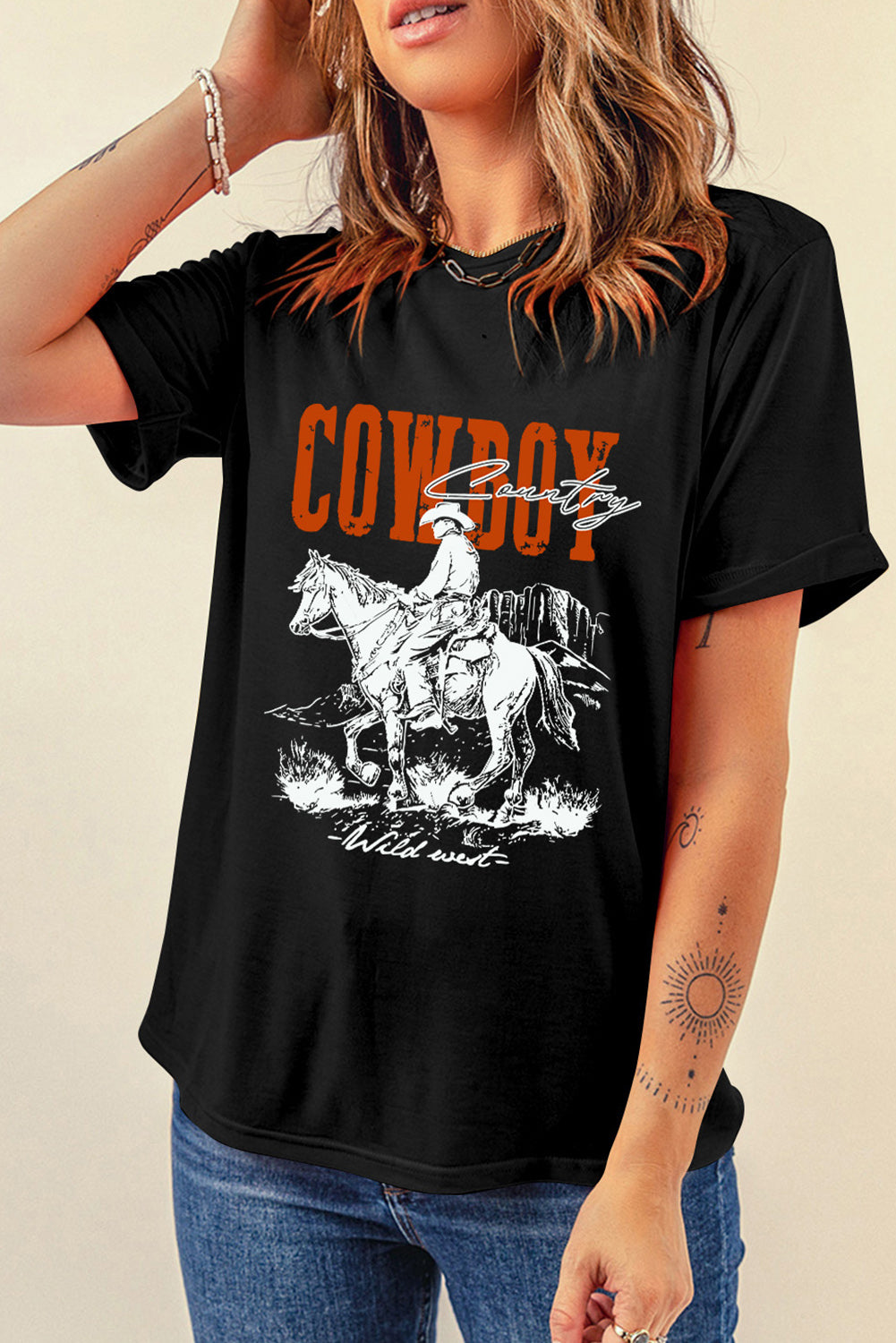 Women's Cowboy Country Tee featuring a bold cowboy graphic and classic fit, perfect for casual, western-inspired outfits."