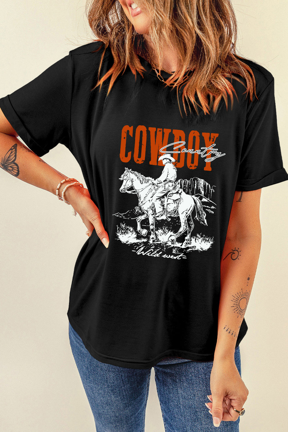 Women's Cowboy Country Tee featuring a bold cowboy graphic and classic fit, perfect for casual, western-inspired outfits."
