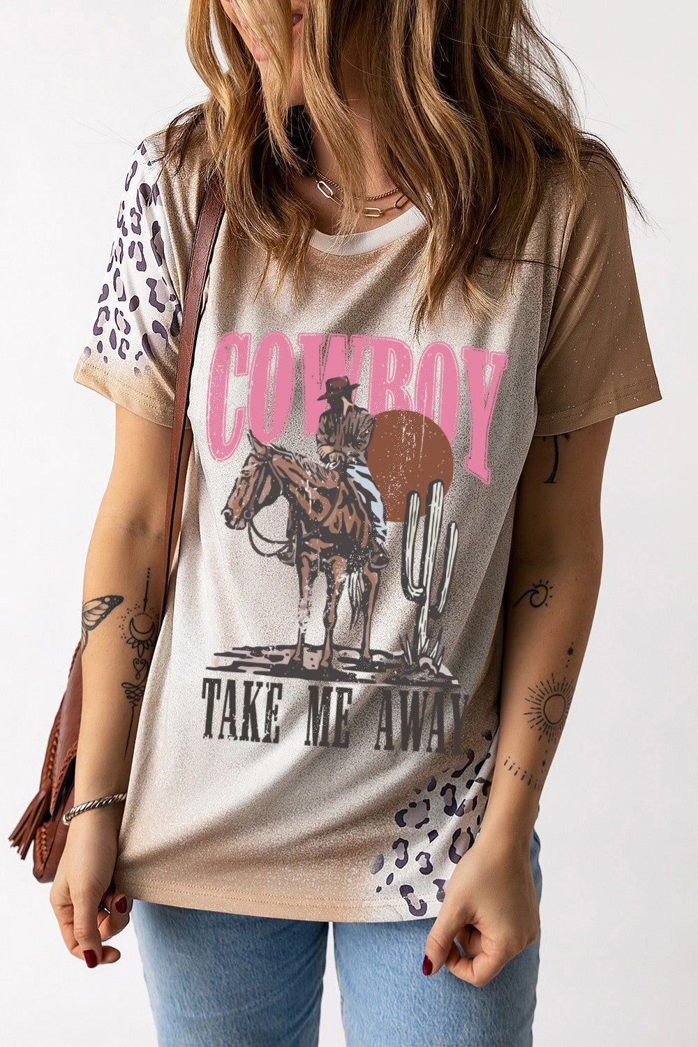 "Cowboy Take Me Away Tee – Country-inspired graphic t-shirt with a Western charm, perfect for cowgirls and free spirits."