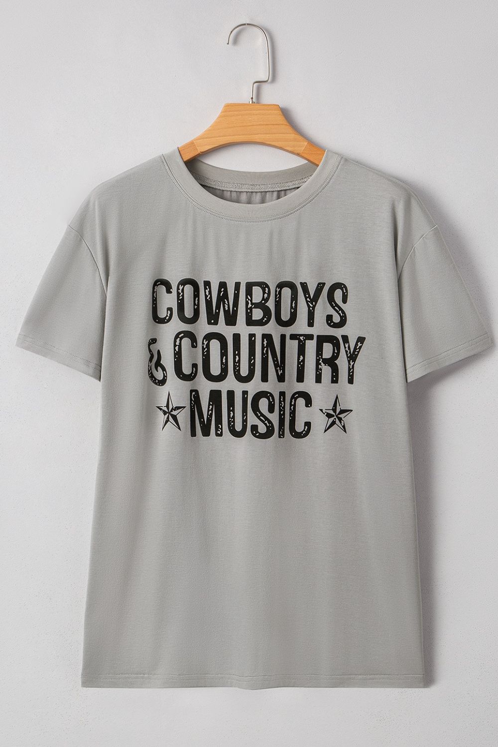 "Cowboys & Country Music Tee – Western-inspired graphic t-shirt for country music lovers and cowboy spirit."