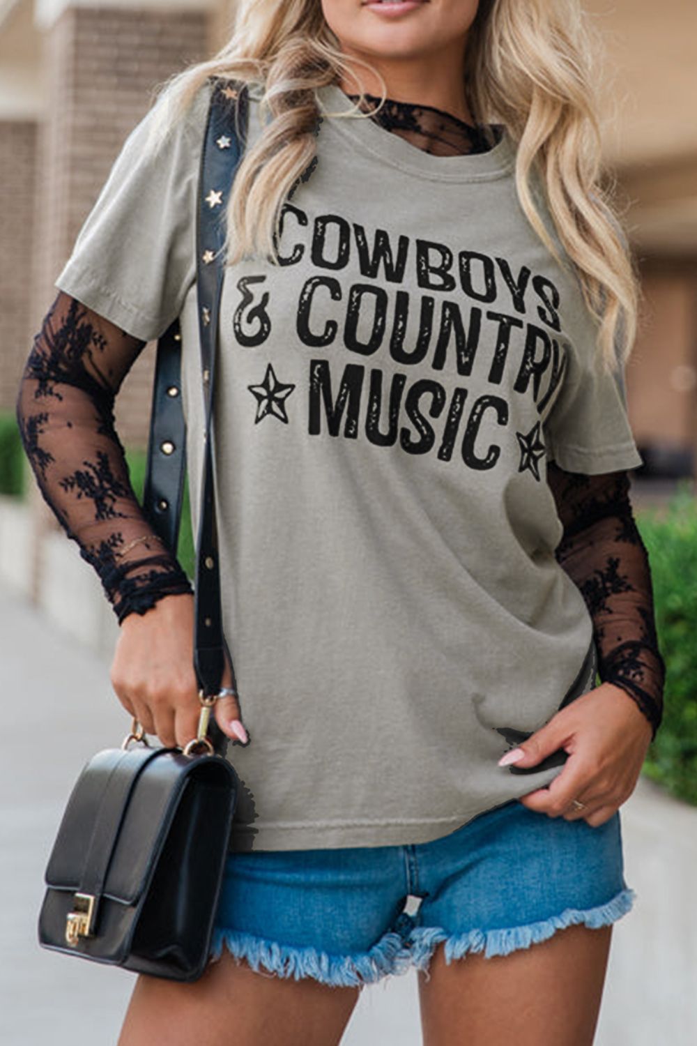 "Cowboys & Country Music Tee – Western-inspired graphic t-shirt for country music lovers and cowboy spirit."