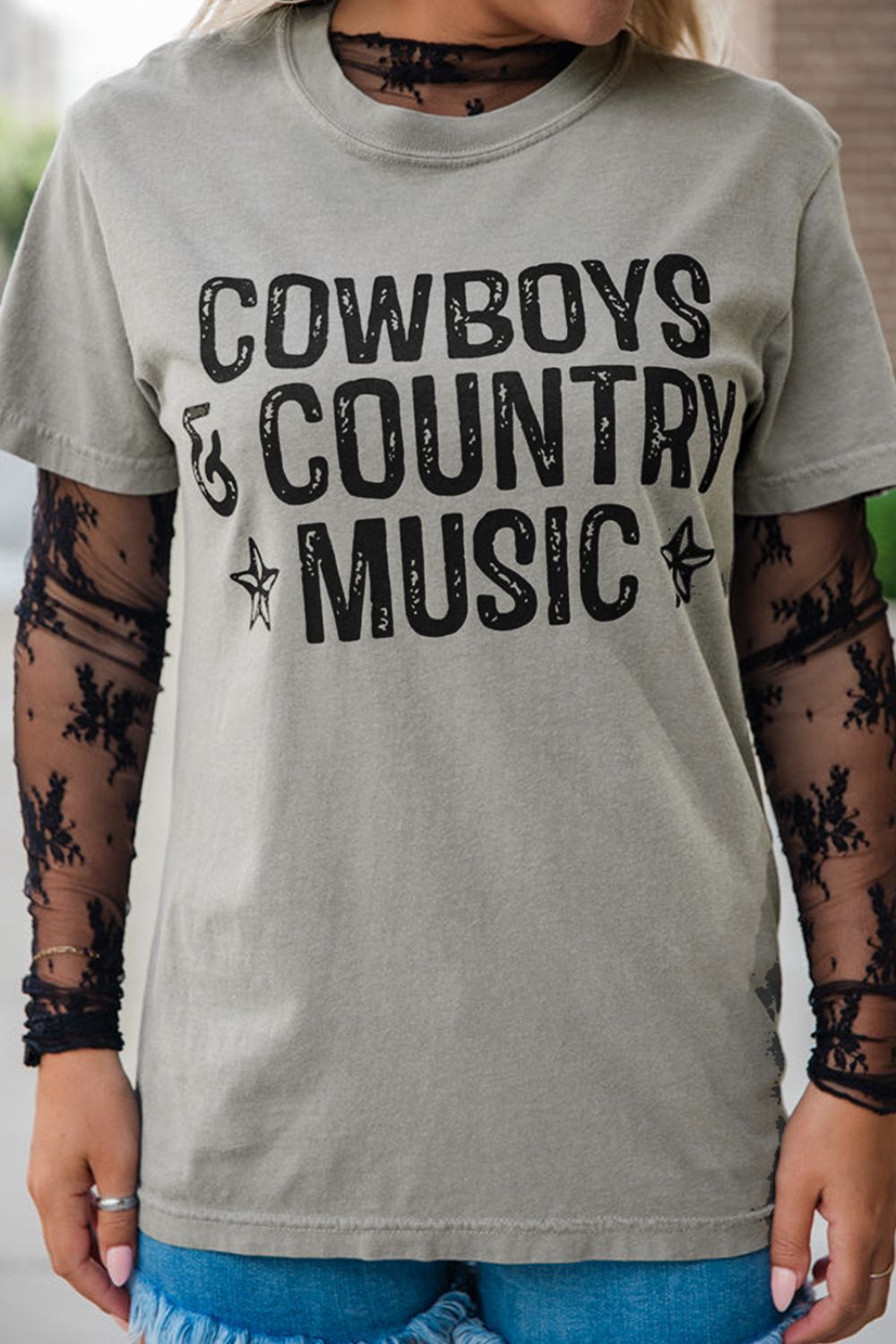 "Cowboys & Country Music Tee – Western-inspired graphic t-shirt for country music lovers and cowboy spirit."