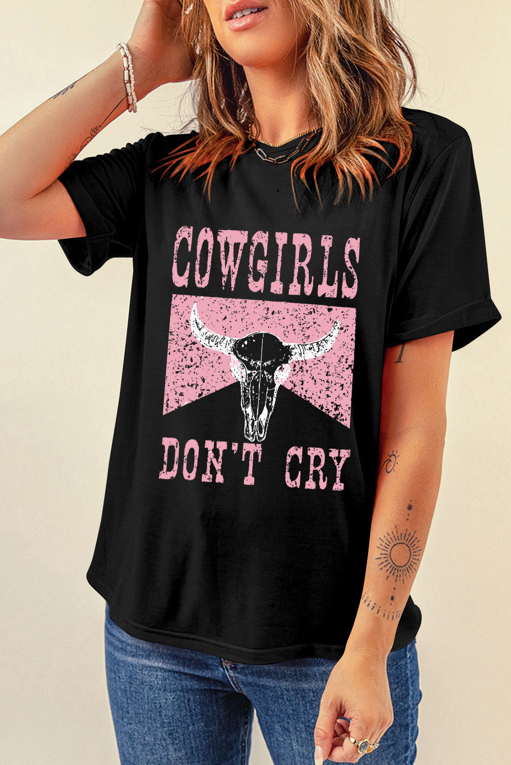 "Cowgirls Don’t Cry Tee – Western-inspired graphic t-shirt with a bold statement, perfect for fearless cowgirls.