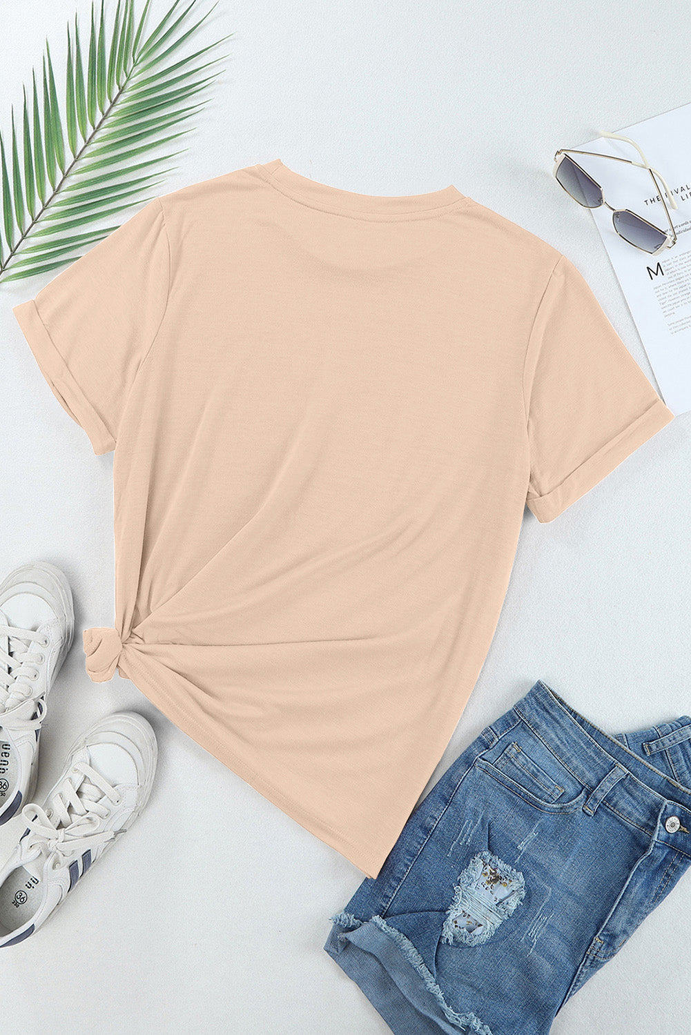 "Howdy Hat Tee – Western-inspired graphic t-shirt featuring a cowboy hat and bold ‘Howdy’ text for a classic country look."