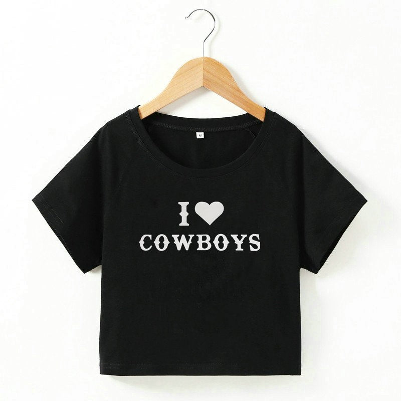 "I ❤️ Cowboys slim fit tee for women in soft cotton fabric, featuring bold letter print design in black, red, and white – perfect for casual Western style."