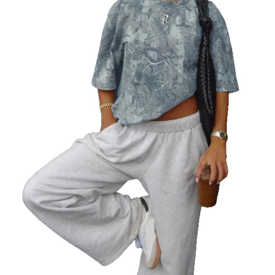 "Leaf printed shirt – stylish breathable casual top for men/women, nature-inspired fashion, lightweight and comfortable outfit."