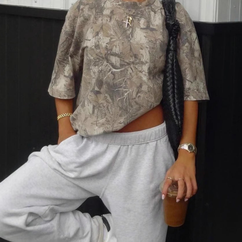 "Leaf printed shirt – stylish breathable casual top for men/women, nature-inspired fashion, lightweight and comfortable outfit."