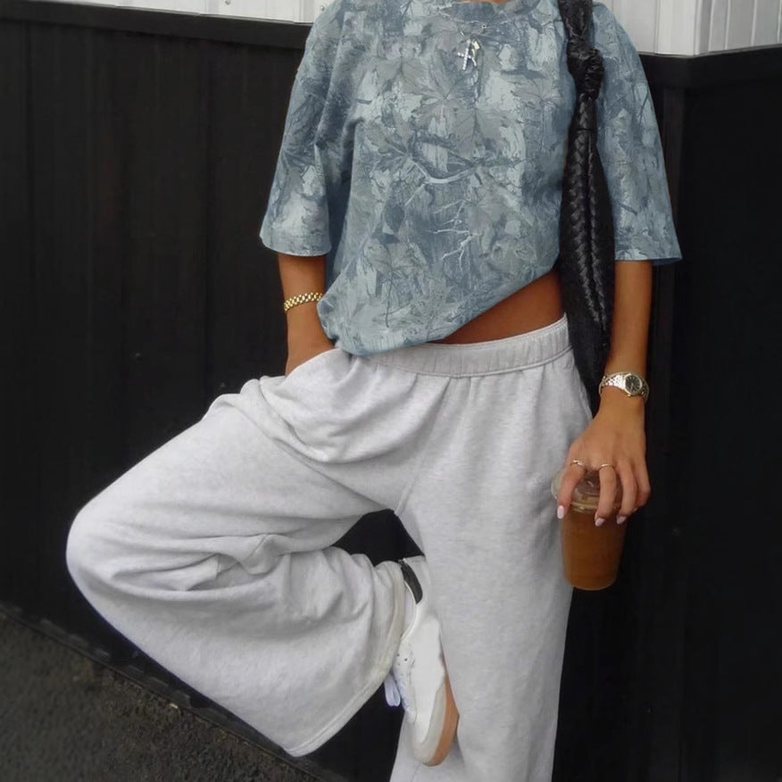 "Leaf printed shirt – stylish breathable casual top for men/women, nature-inspired fashion, lightweight and comfortable outfit."