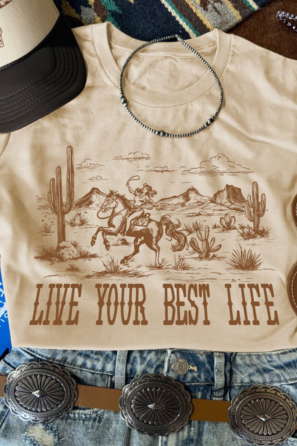 "Live Your Best Life Tee – Inspirational graphic t-shirt with a positive message, perfect for everyday wear."