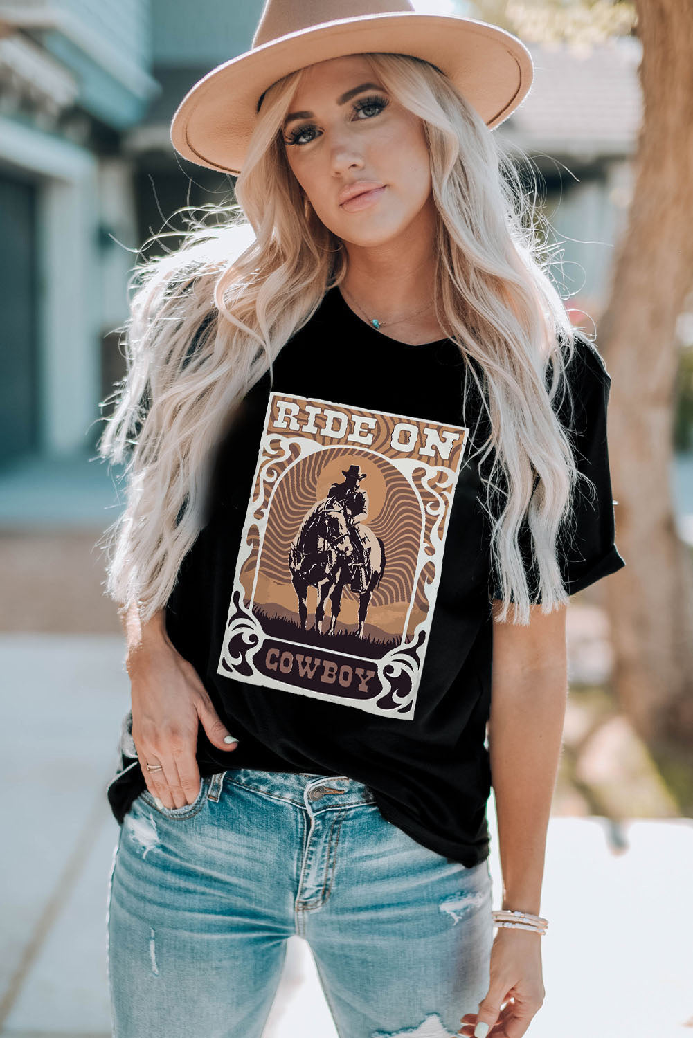 "Ride On Cowboy Tee – Western-inspired graphic t-shirt with bold cowboy design, perfect for rodeo fans and country lovers."