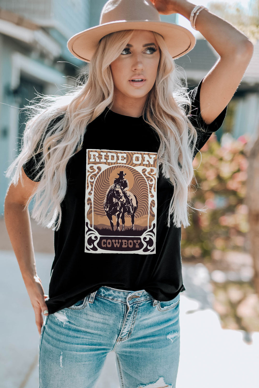 "Ride On Cowboy Tee – Western-inspired graphic t-shirt with bold cowboy design, perfect for rodeo fans and country lovers."