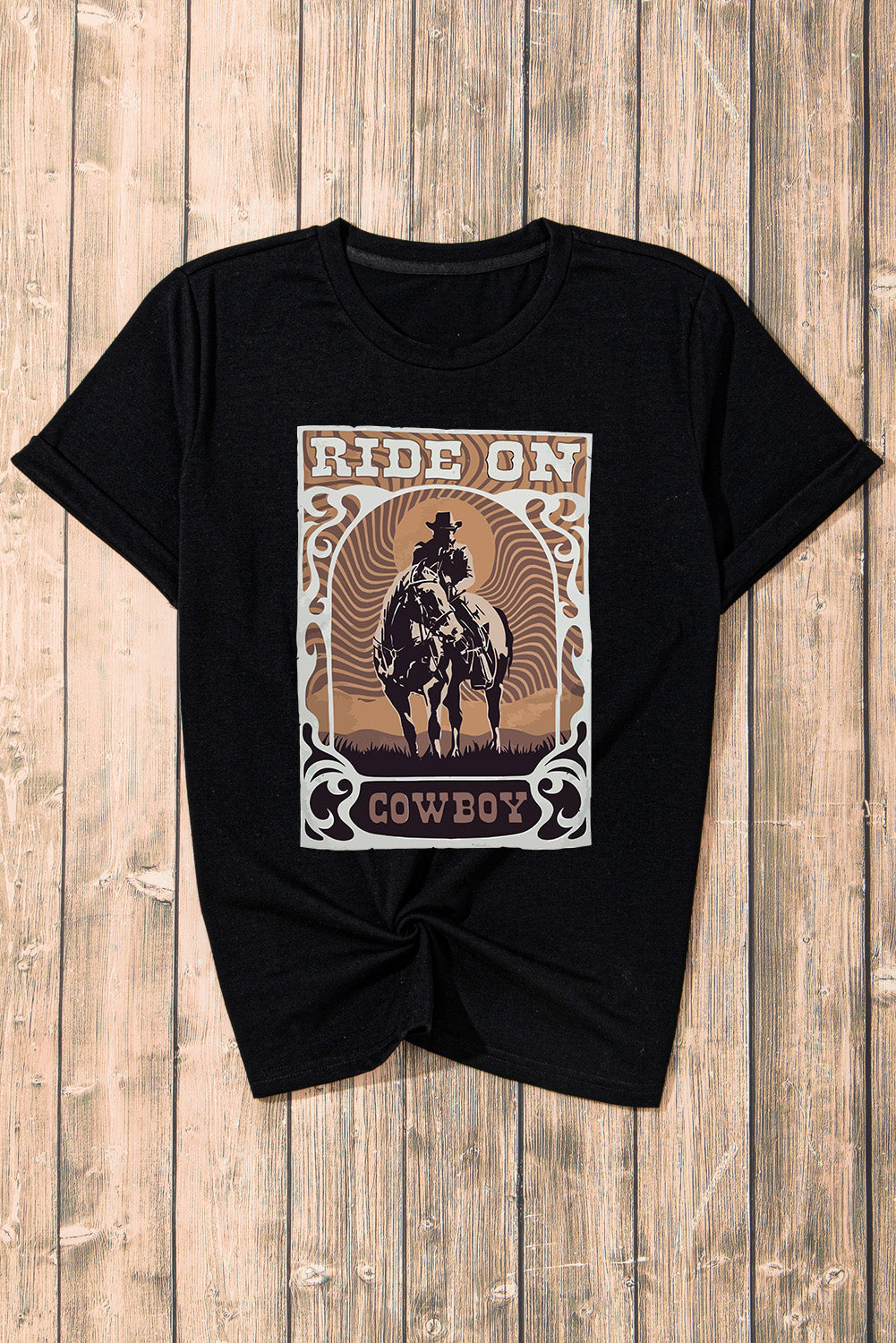 "Ride On Cowboy Tee – Western-inspired graphic t-shirt with bold cowboy design, perfect for rodeo fans and country lovers."