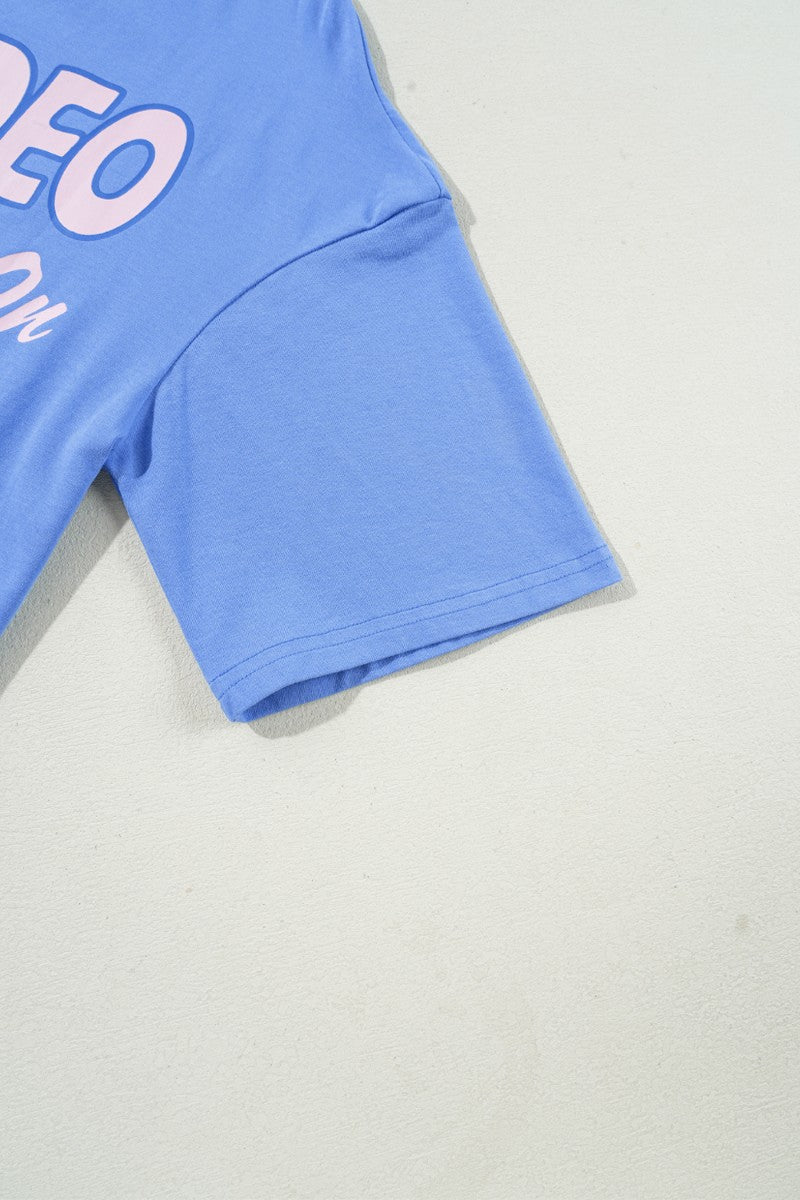 "Rodeo Goes On Forever Tee – Western-inspired graphic t-shirt celebrating the timeless spirit of the rodeo."
