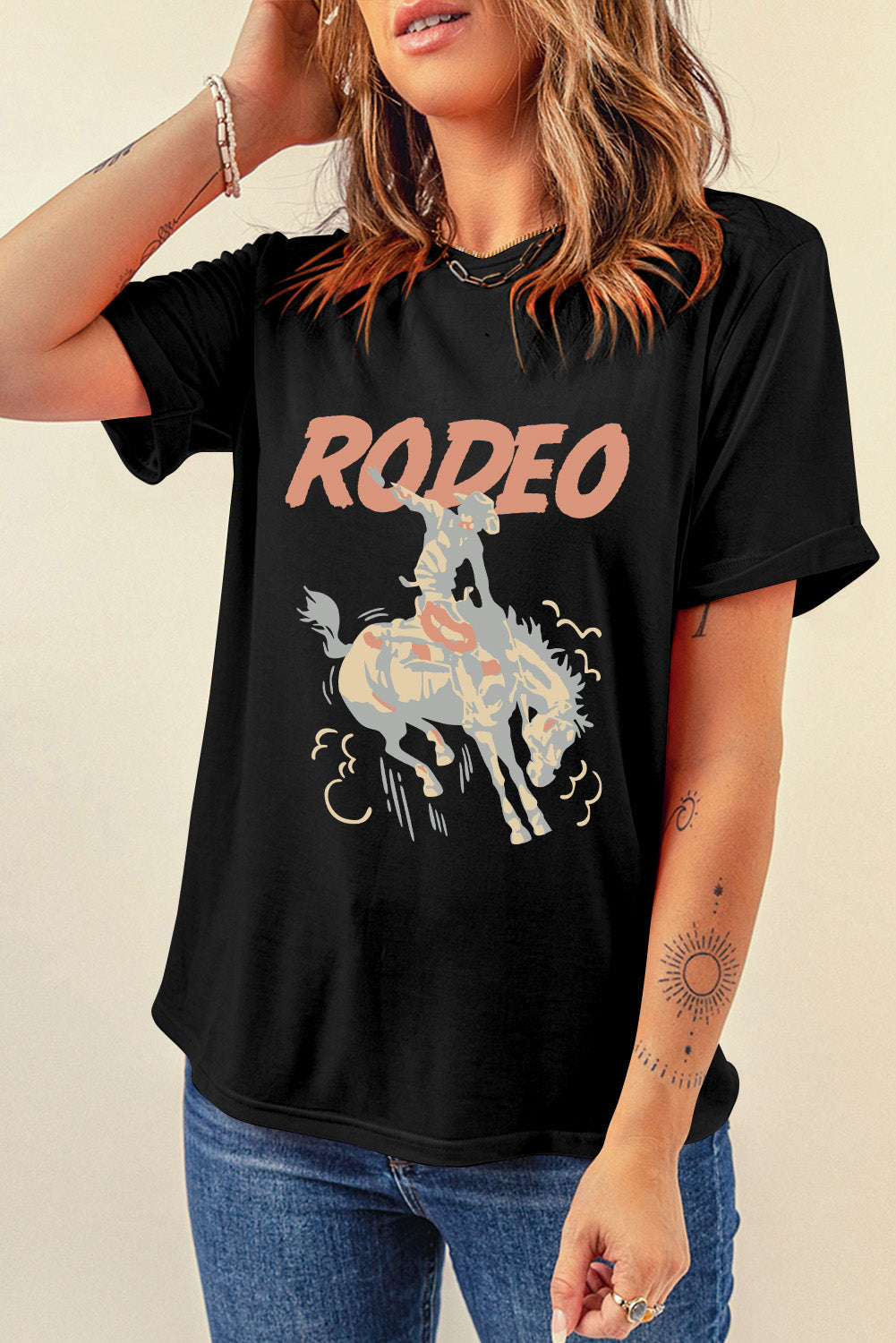 "Rodeo Tee – Western-inspired graphic t-shirt with a rugged style, perfect for country lovers and rodeo fans."