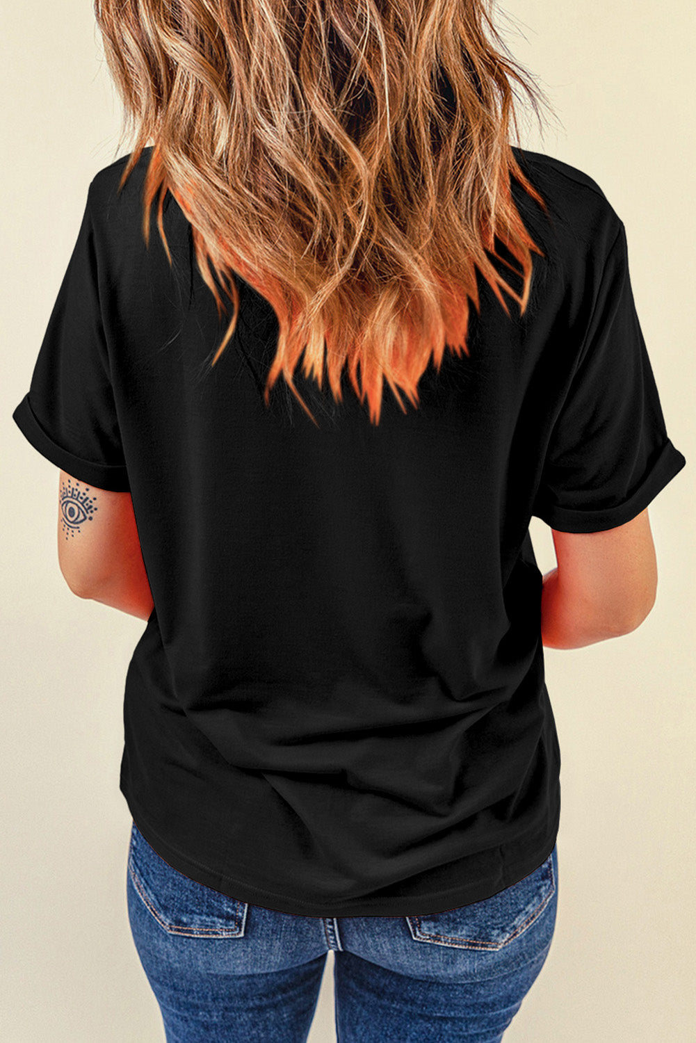 "Texas Bow Tee with a playful bow design, featuring a bold graphic print perfect for showing off your Texas pride in a stylish and casual way."