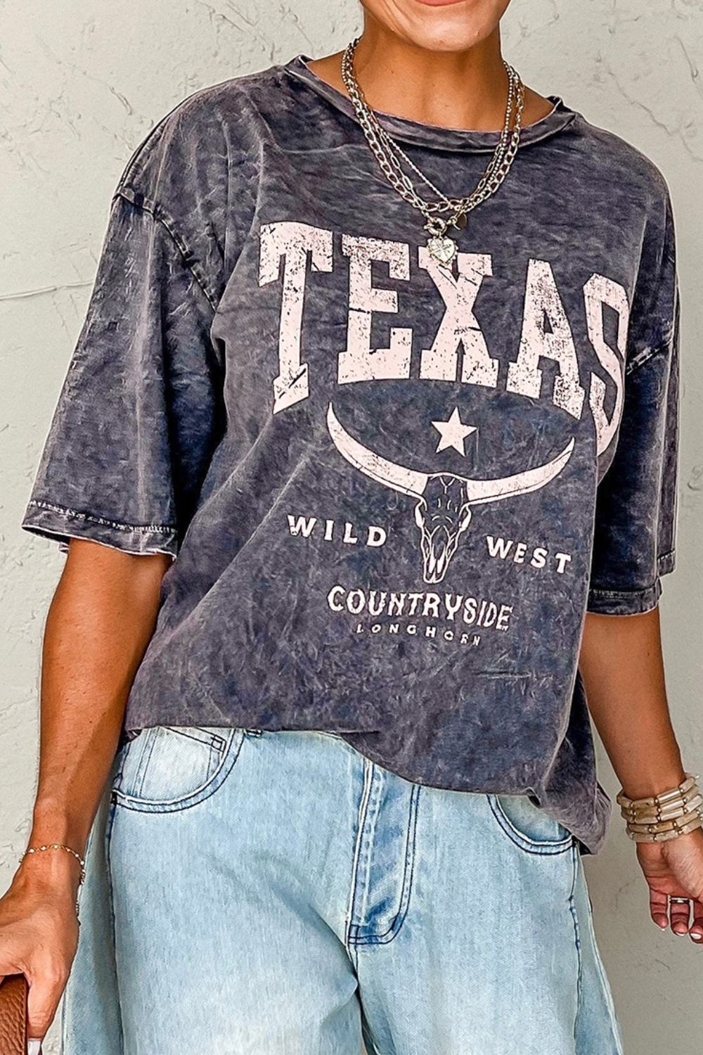 "Texas Steer Tee – Western-inspired graphic t-shirt featuring a bold Texas steer design, perfect for cowboy and Texas pride."