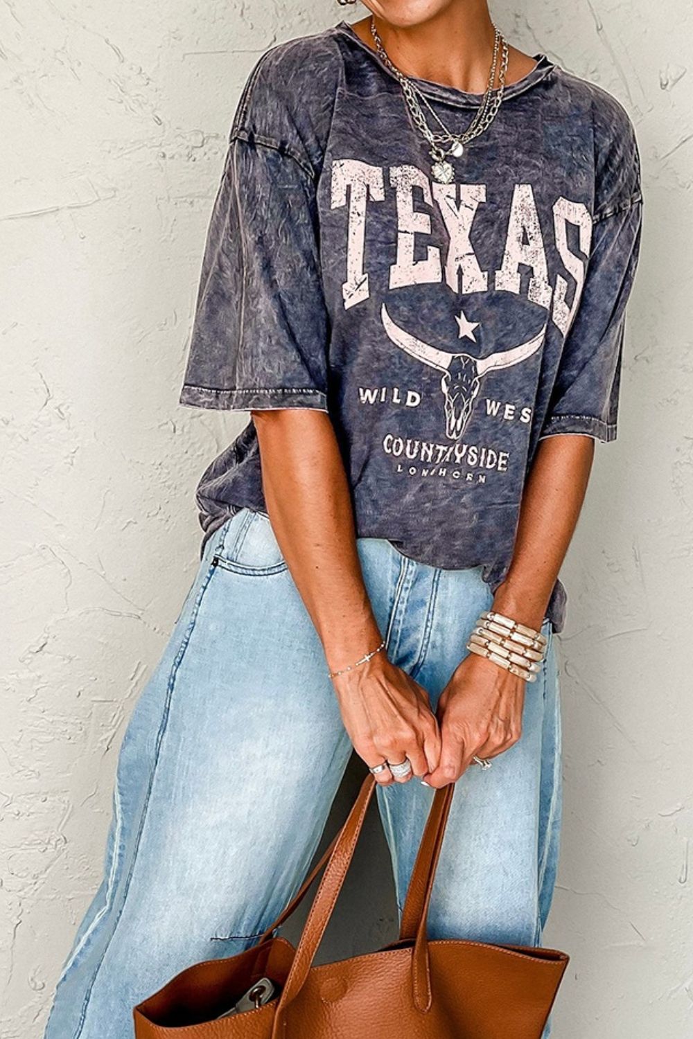 "Texas Steer Tee – Western-inspired graphic t-shirt featuring a bold Texas steer design, perfect for cowboy and Texas pride."
