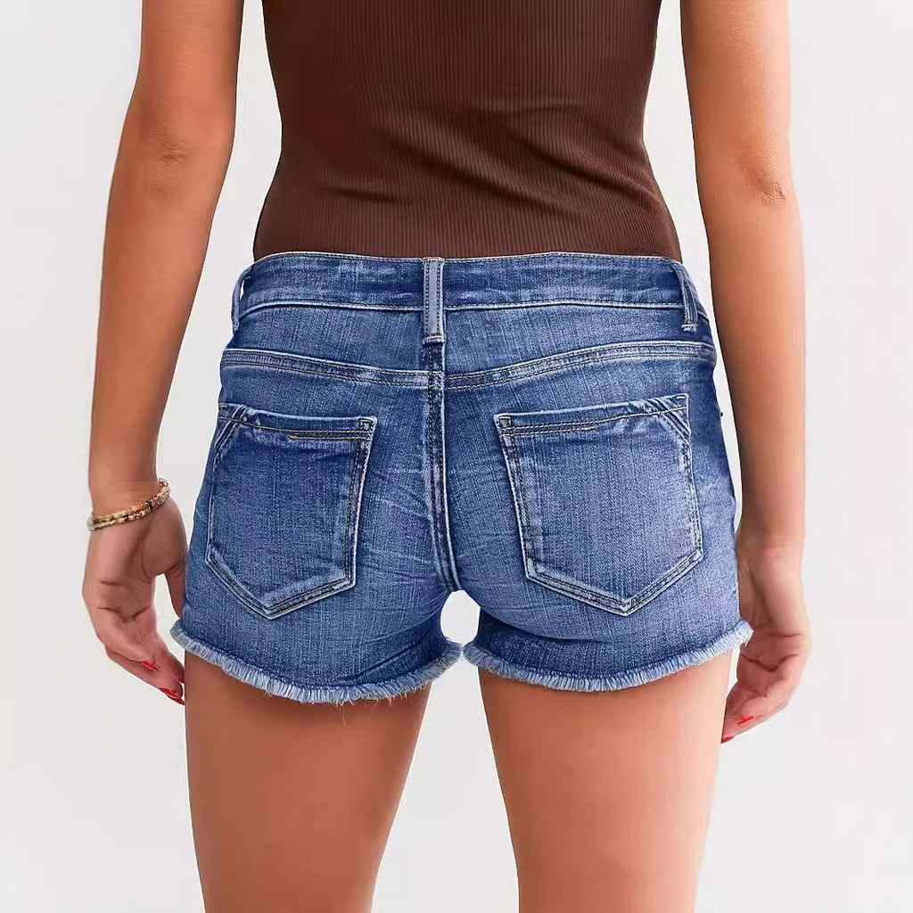 "Trendy ripped denim shorts – stylish street fashion, light blue distressed jean shorts for a chic casual look."