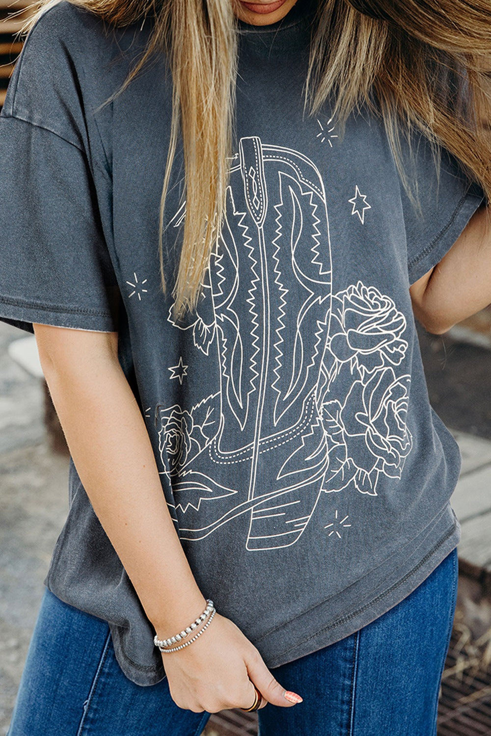 "Western Cowboy Boots Tee – Classic country graphic t-shirt featuring cowboy boots design, perfect for Western style lovers."