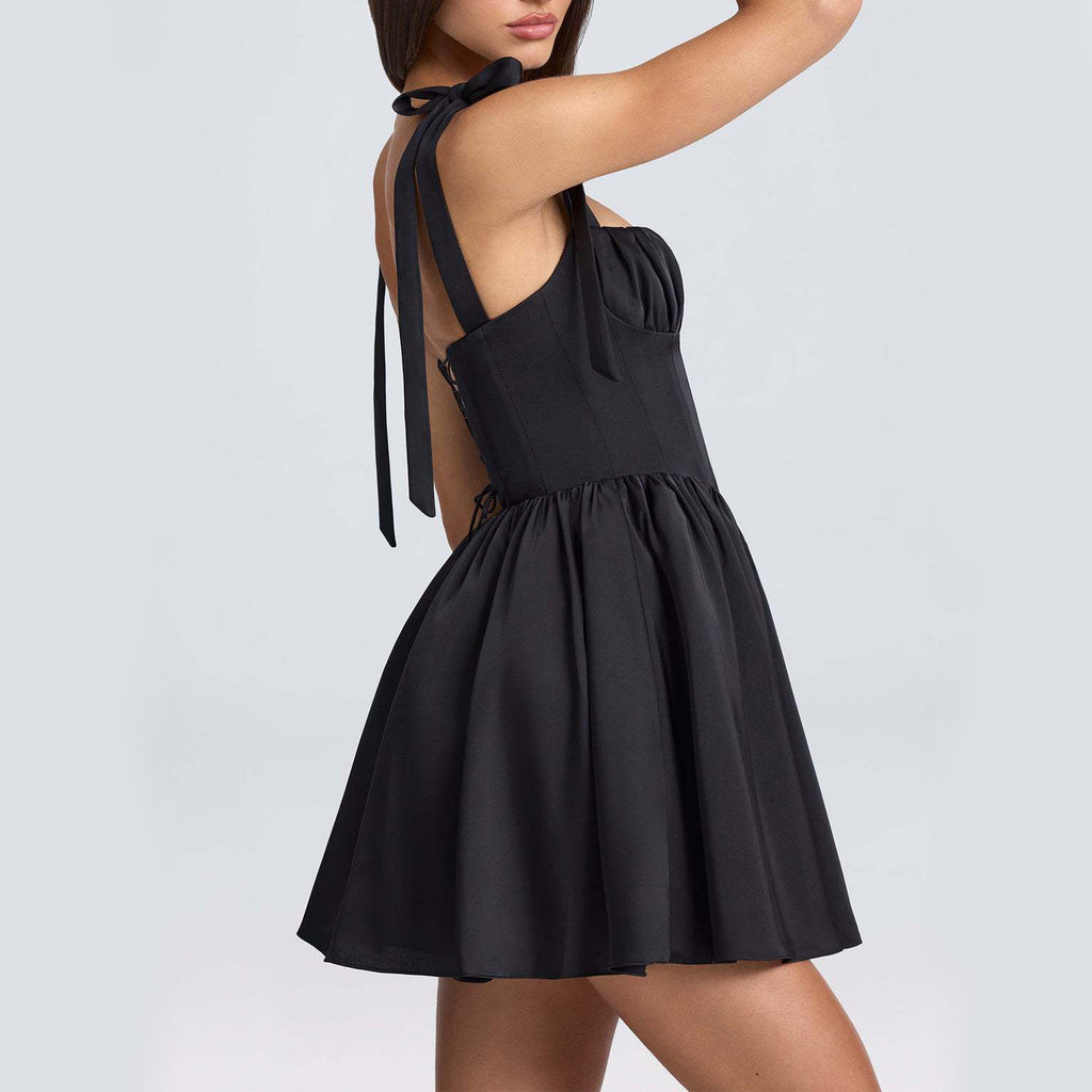"Women's Bow-Tied Strap Dress with adjustable bow straps and flattering silhouette, perfect for casual and elegant occasions."