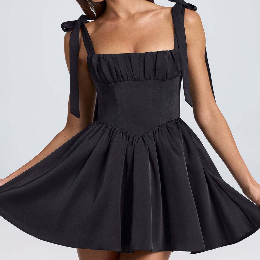 "Women's Bow-Tied Strap Dress with adjustable bow straps and flattering silhouette, perfect for casual and elegant occasions."