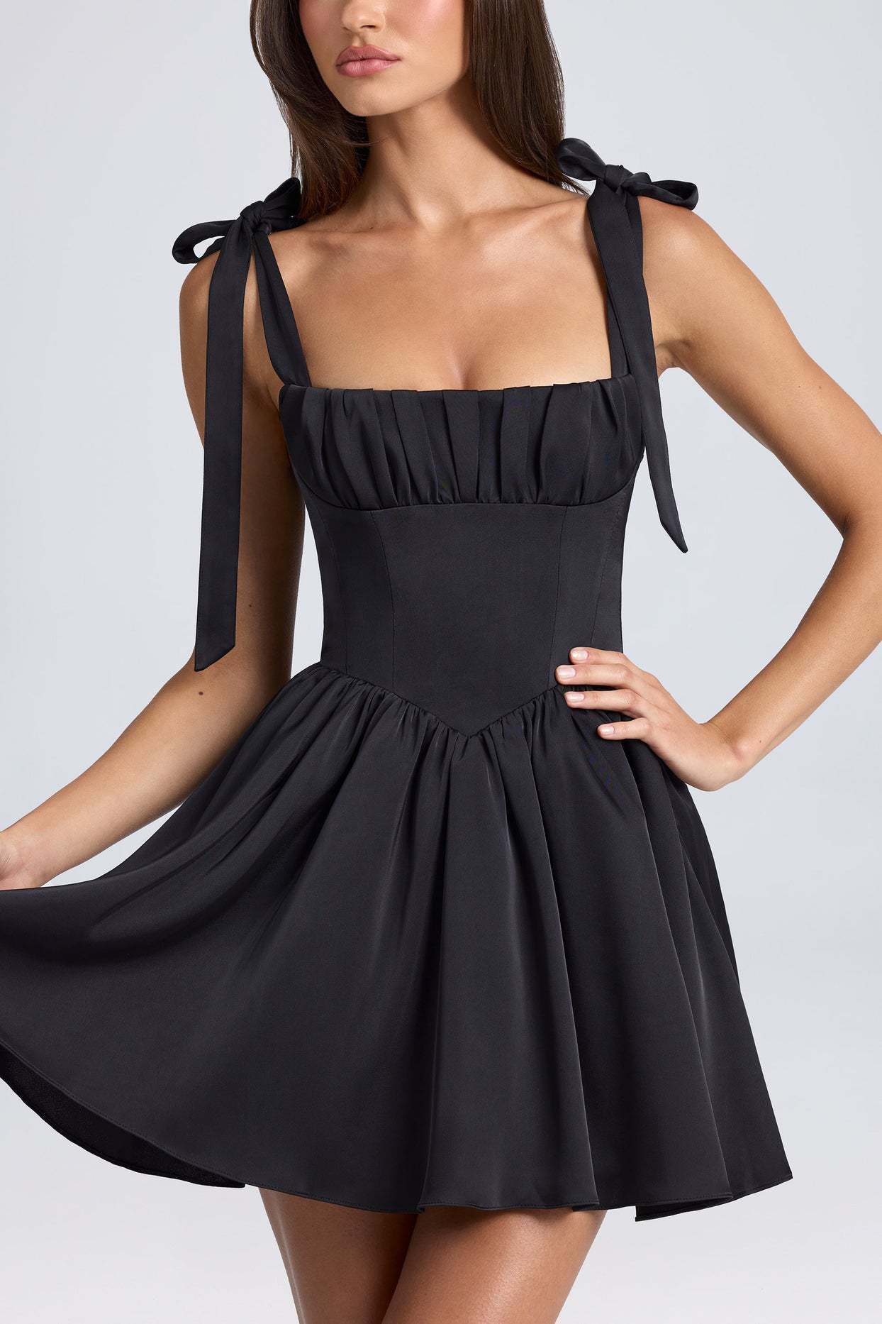 "Women's Bow-Tied Strap Dress with adjustable bow straps and flattering silhouette, perfect for casual and elegant occasions."