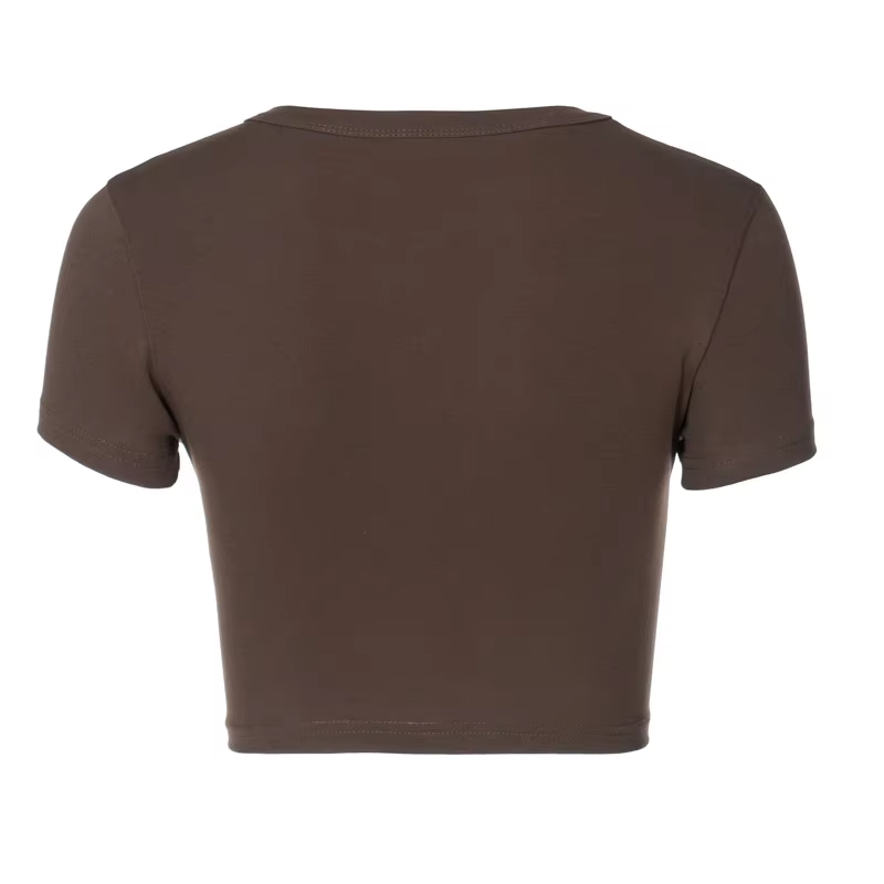 Brown cowgirl crop top with bold white lettering, short sleeves, and a trendy relaxed fit. Western-inspired casual fashion.