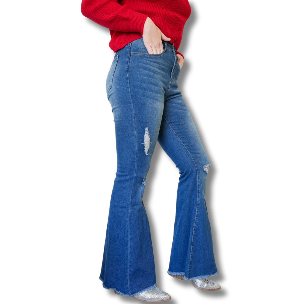 "Dark blue high-waist flare jeans with stretch, distressed details, and a flattering fit."