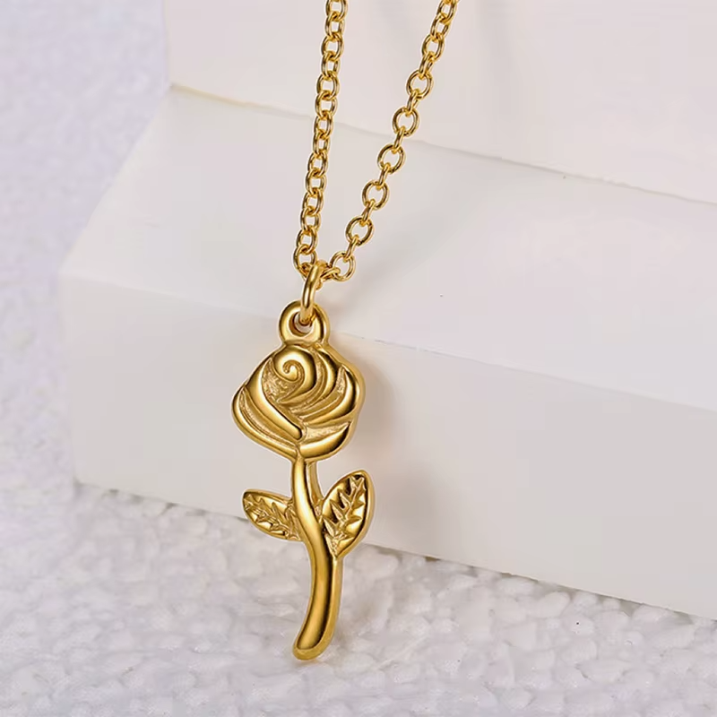 Gold rose necklace with stainless steel pendant, delicate floral jewelry, elegant gift for women.