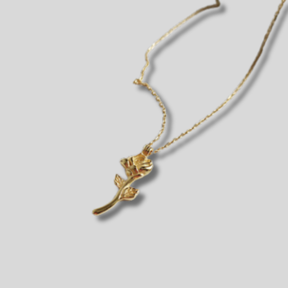 Gold rose necklace with stainless steel pendant, delicate floral jewelry, elegant gift for women.