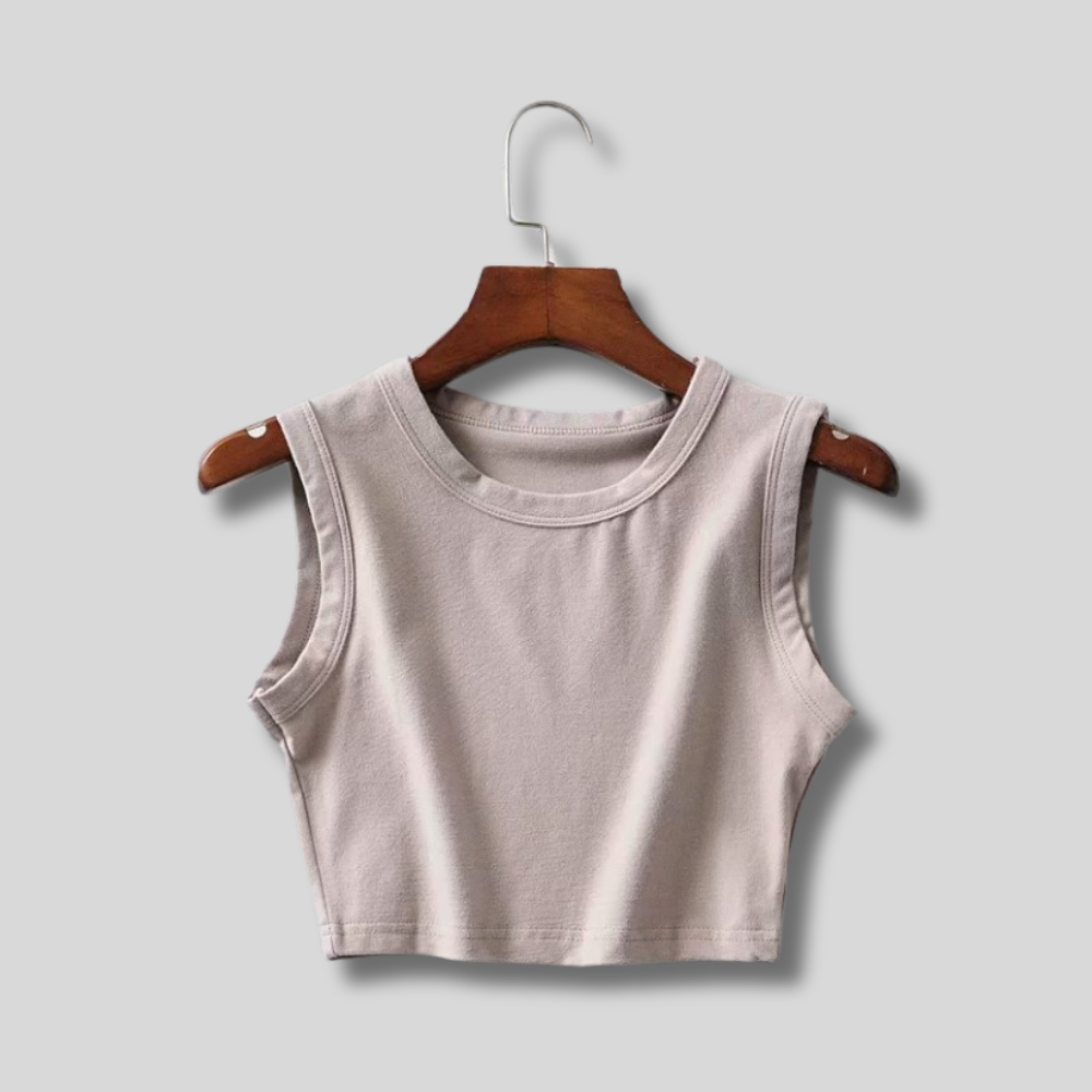 "Neutral cropped tank top – stylish, minimalist, and versatile for any outfit. Soft fabric, perfect for everyday wear."