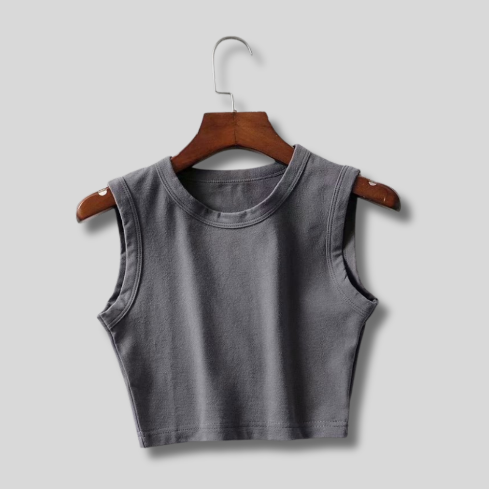 "Neutral cropped tank top – stylish, minimalist, and versatile for any outfit. Soft fabric, perfect for everyday wear."