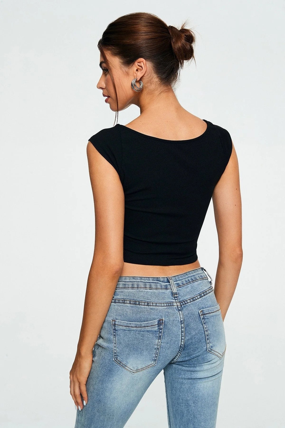 ribbed_sleeveless_crop. streetwear modern, minimalist designs with bold aesthetics and premium fabric."